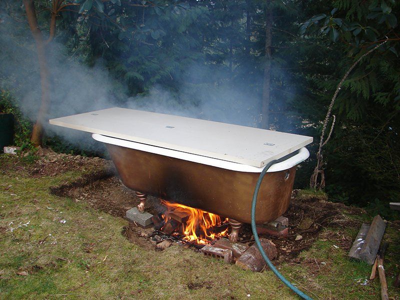 Old bathtub into hot tub