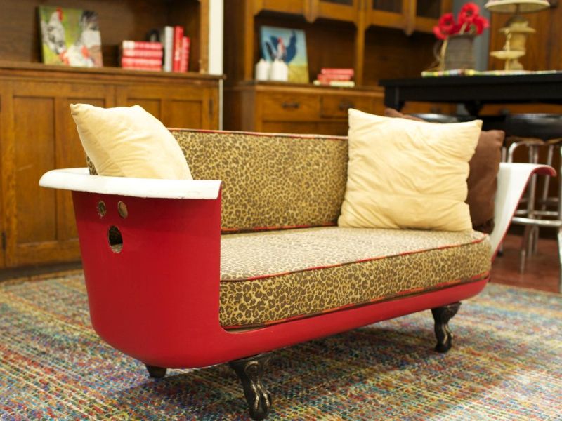 bathtub repurposed into a sofa with upholstery 