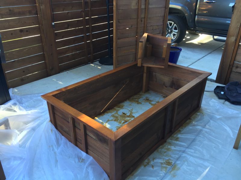 turn old bathtub into a natural-looking pond