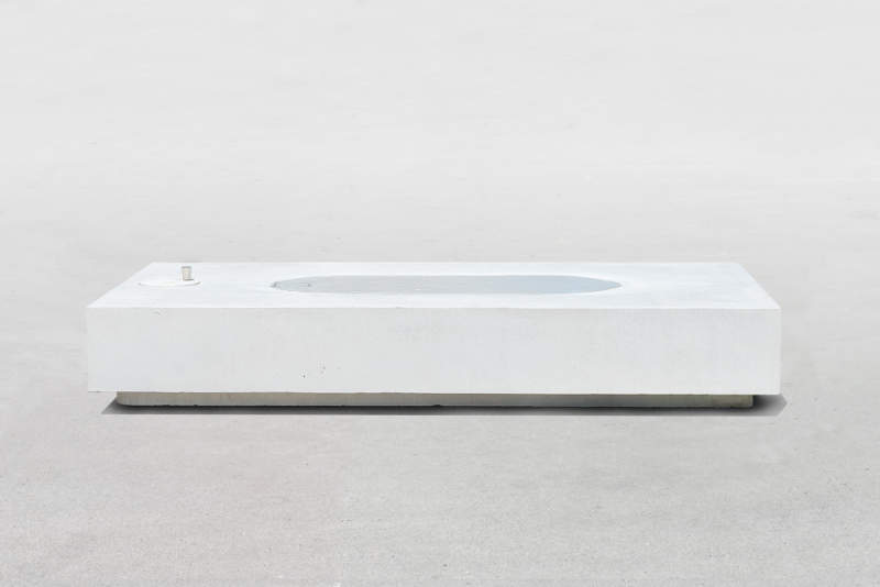 Jean Couvreur’s concrete public bench features real water surface 