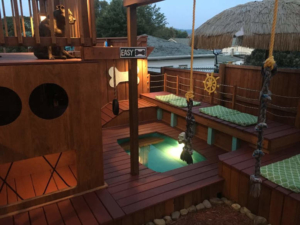 Man builds expansive dog mansion complete with pool and deck