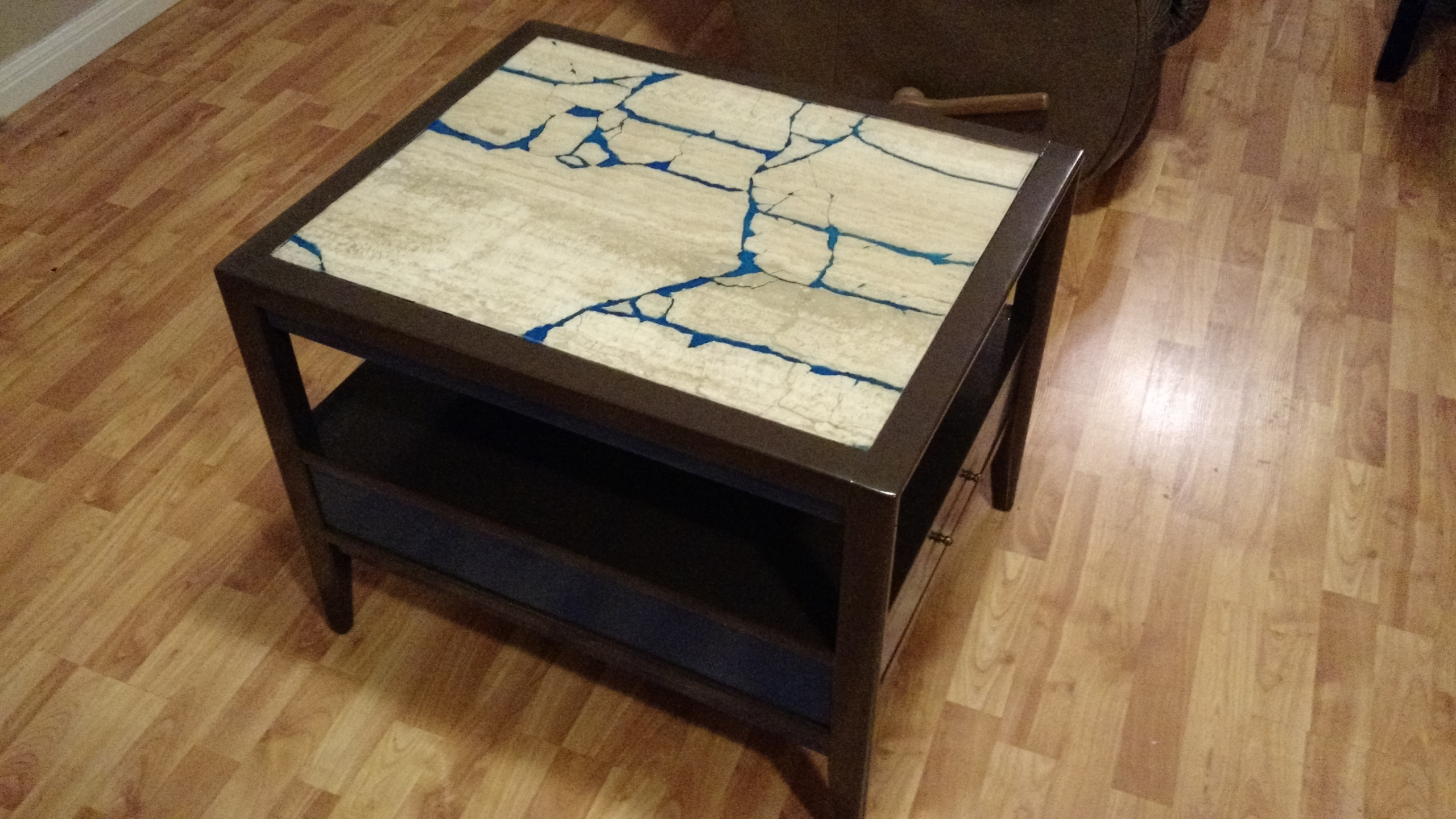 Refurbished glow in the dark marble end table.