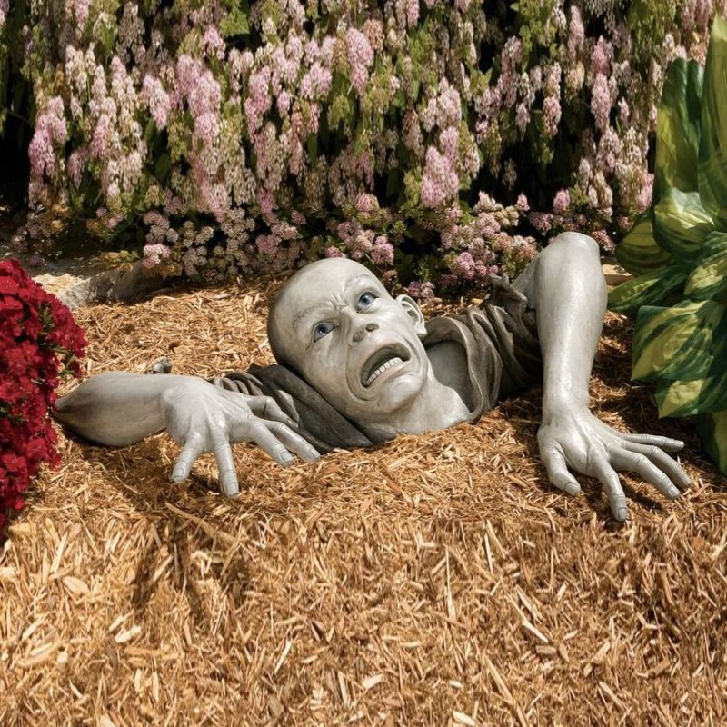 Zombie buried in the garden looks freaky