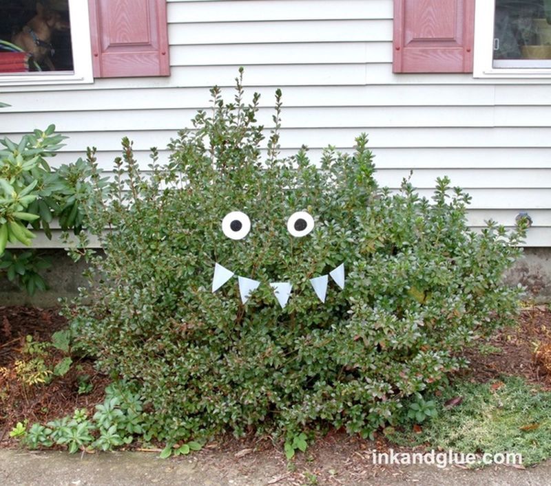 Halloween bush monster and spooky eyes