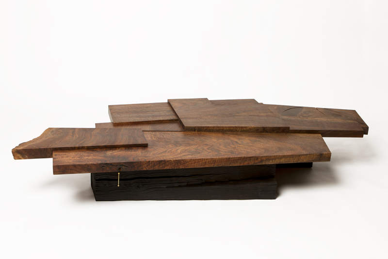 Strike/Slip table by Taylor Donsker can be split into two halves