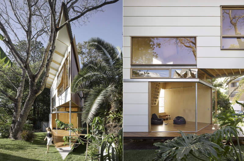 Treehouse-inspired backyard extension with an indoor climbing wall