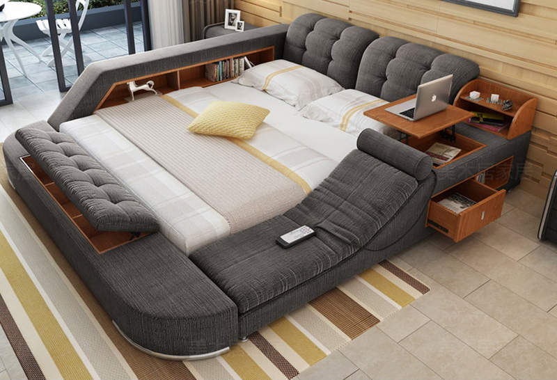 Tatami multimedia bed has built-in massage chair and pop-up table 