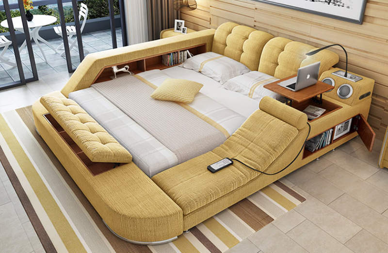 Tatami multimedia bed has built-in massage chair and pop-up table 