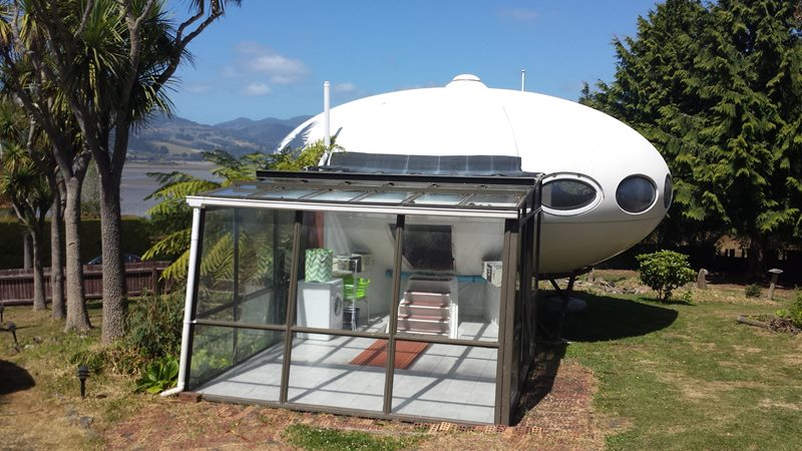 This UFO-shaped Futuro House is up for sale in New Zealand