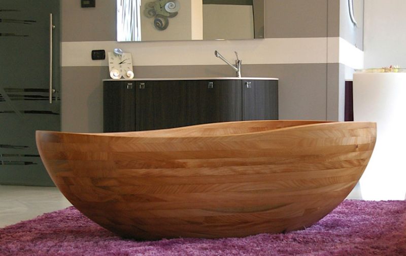 stone and wooden bathtub