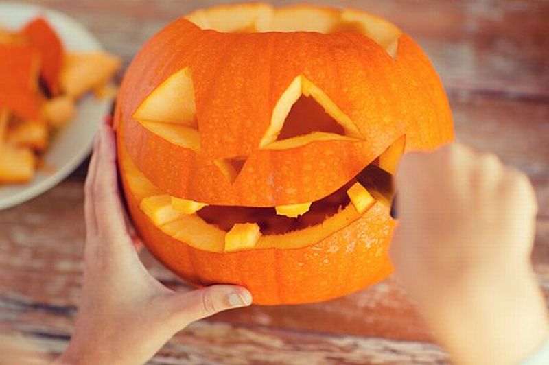 Carve Halloween pumpkin face