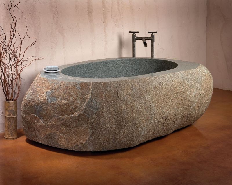 stone and wooden bathtub