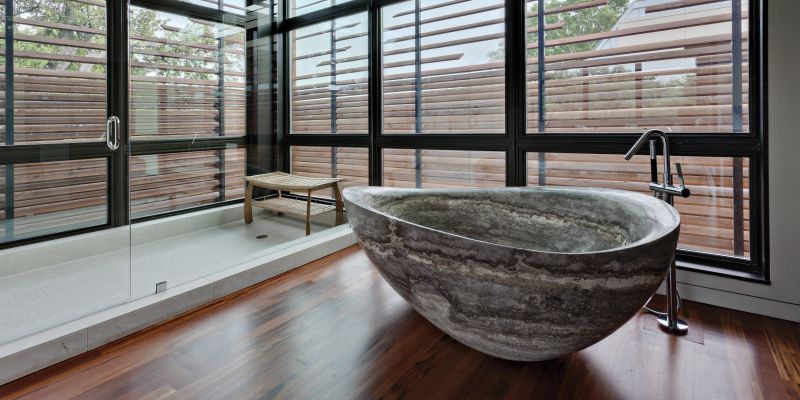 stone and wooden bathtub