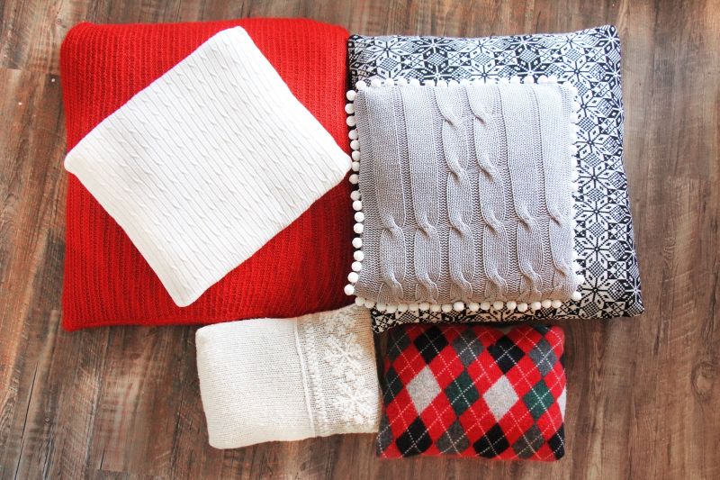 Christmas-themed upcycled sweater cushion covers 