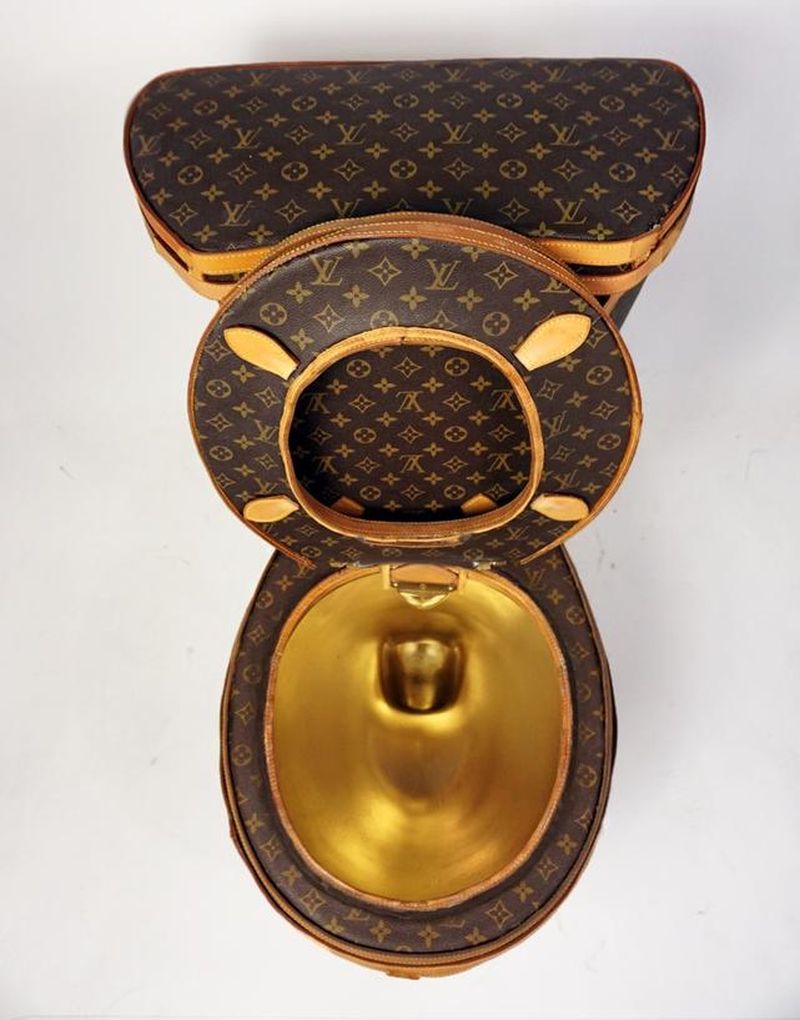 Loo-uis Vuitton golden toilet by Illma Gore is up for sale at Tradesy for $100,000 