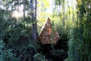 Studio North’s human-sized Birdhut features 20 birdhouses on its façade