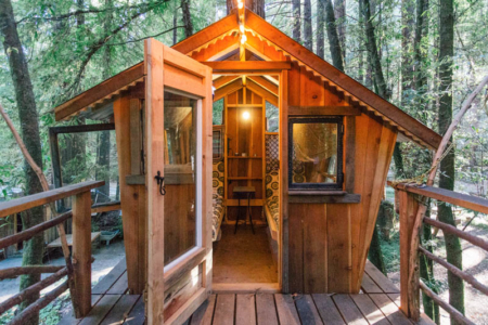 This Boho Style Cabin Comes with its Own Treehouse and Zip Line