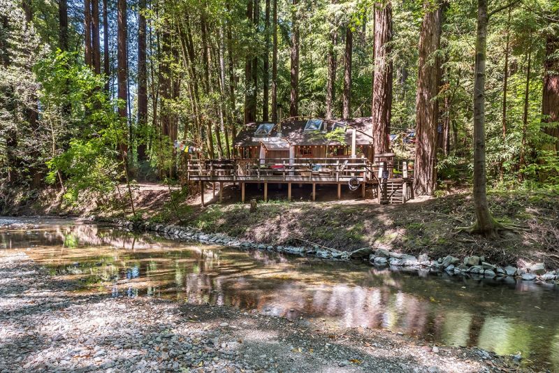 This boho style cabin comes with its own treehouse, zip lines