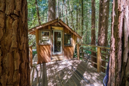 This Boho Style Cabin Comes with its Own Treehouse and Zip Line