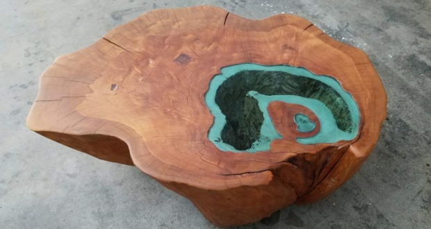 Man builds lake coffee table from a 400-year-old tree trunk