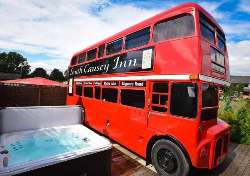 Couple Turns 1960s red Double-Decker Bus into Luxury B&B