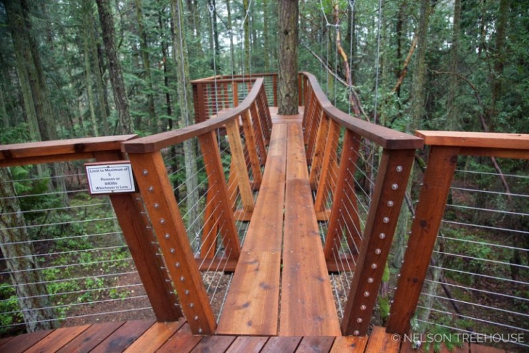 This Treehouse in San Juan Islands Features Fire Pole from Deck