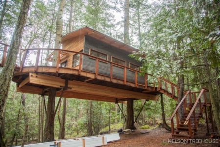 This Treehouse in San Juan Islands Features Fire Pole from Deck