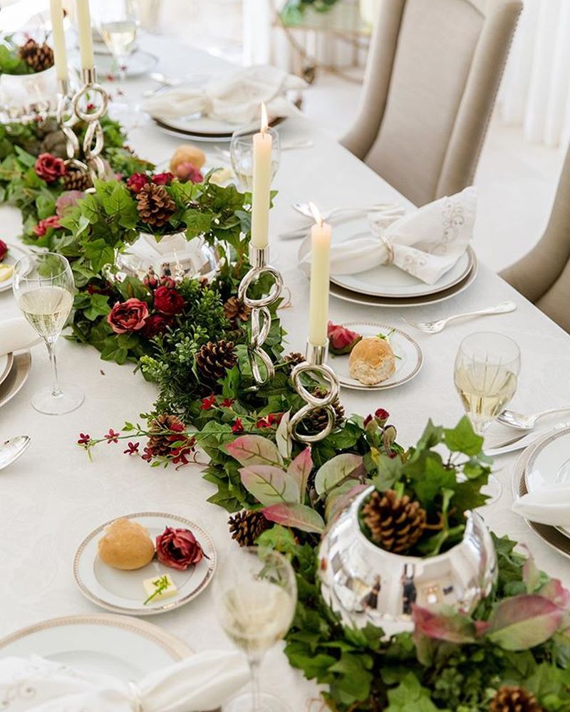 red Thanksgiving Table Decor with pinecones  