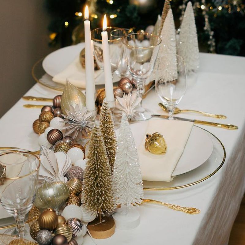 Christmas Tablescape with bottle brush trees and golden ornaments  