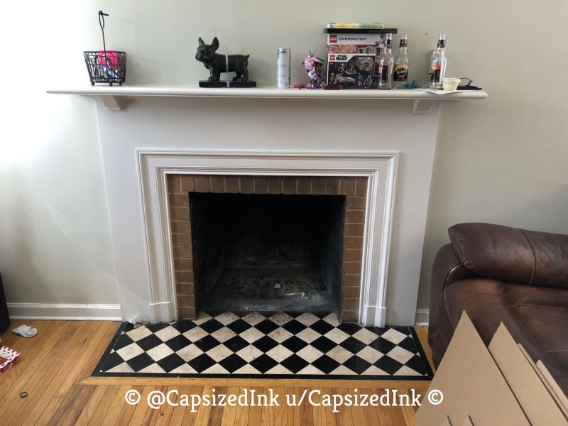 Redditor Turns Empty Fireplace into Little Dog Condo 