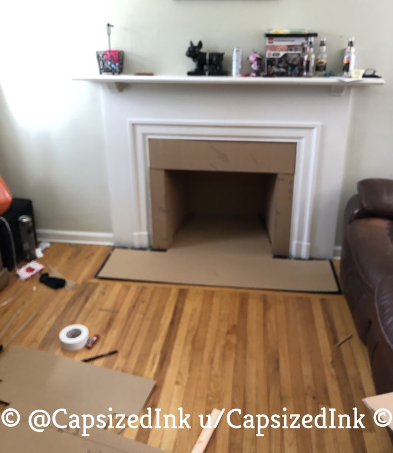 Redditor Turns Empty Fireplace into Little Dog Condo 