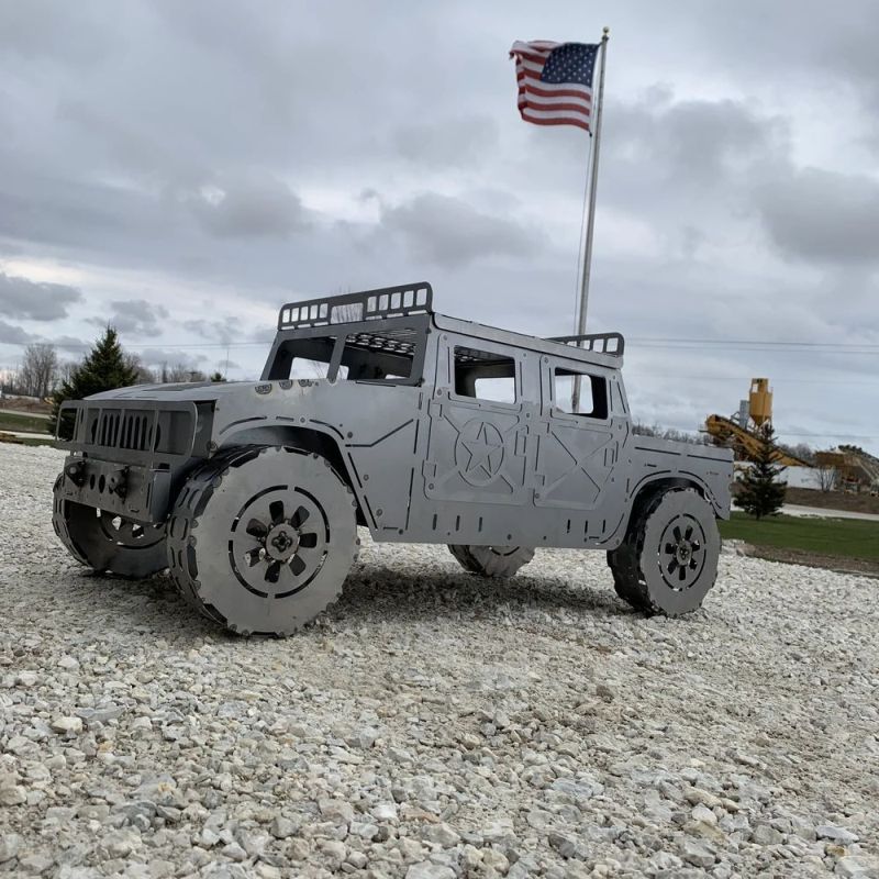 These Vehicle Fire Pits by Metal Art of Wisconsin are Lit