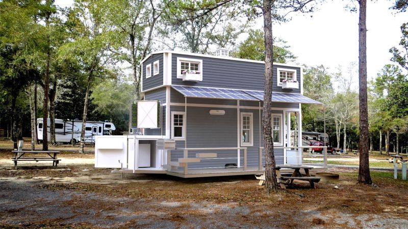 Wilderwise Tiny House with Expandable Roof Increases Headroom in Loft 