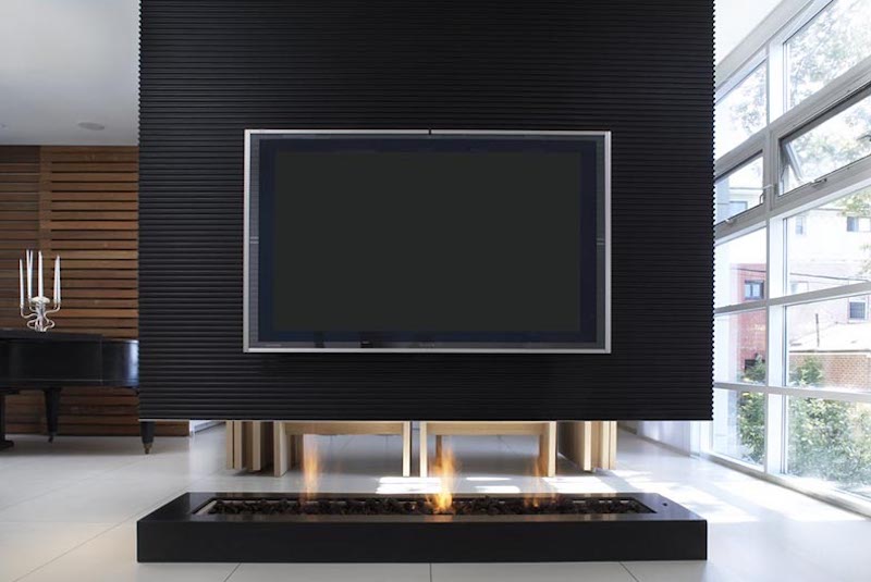 room-divider-with-fireplace-recessed-television-by-Cecconi Simone