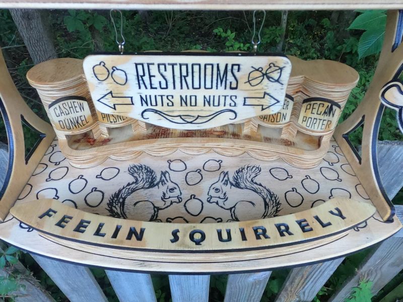 Woodworker Goes Viral for Making an Adorable Bar for Squirrels 