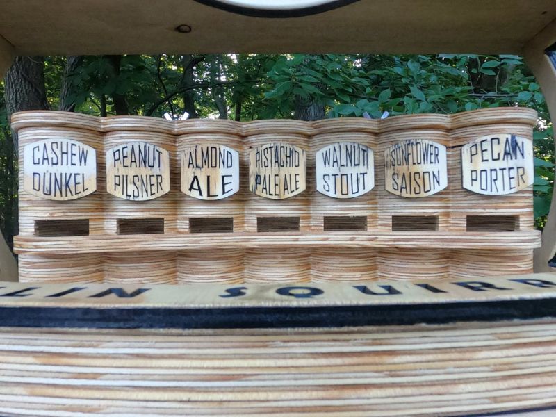 Woodworker Goes Viral for Making an Adorable Bar for Squirrels 