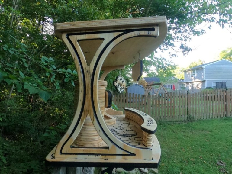 Woodworker Goes Viral with Adorable Bar for Squirrels