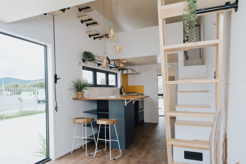 Tiny House with Cat-Friendly Interiors and Two Lofts 