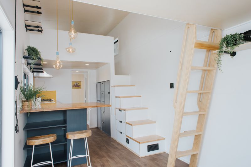 Tiny House with Cat-Friendly Interiors and Two Lofts 