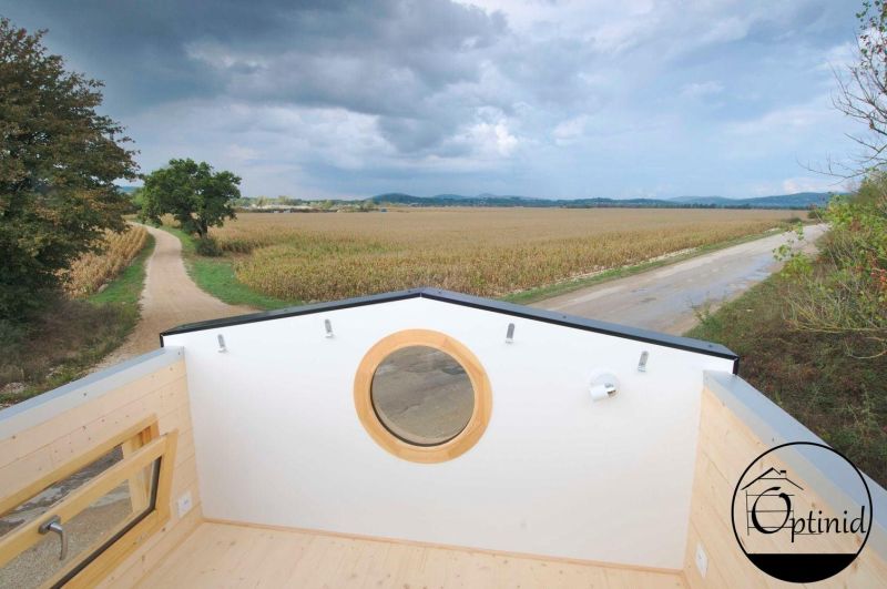 Optinid Builds Tiny House with Sliding Roof for Marie & Ange