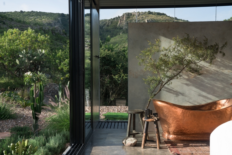 Casa Etérea Off-Grid Glass House Blends Into the Slopes of an Extinct Volcano