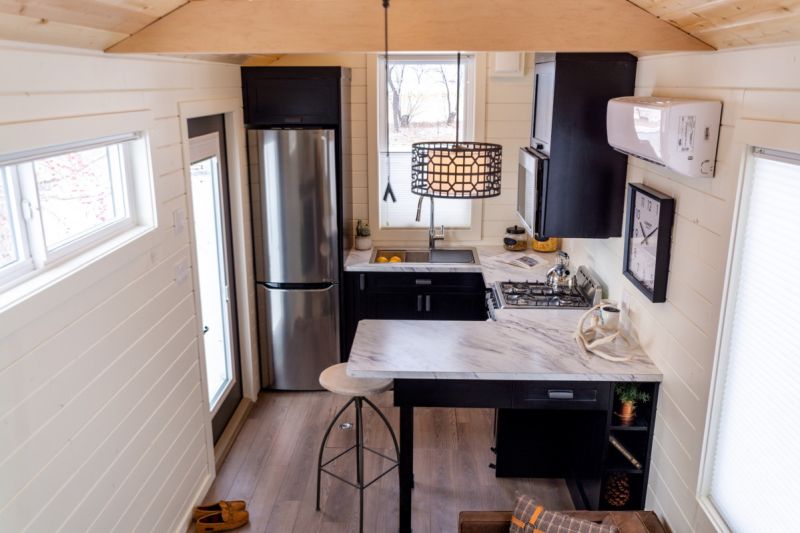 The Phoenix by Teacup Tiny Homes Features Overhanging Loft Bedroom