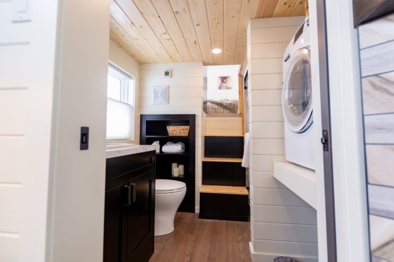 Phoenix Tiny House on Wheels Features Overhanging Loft Bedroom