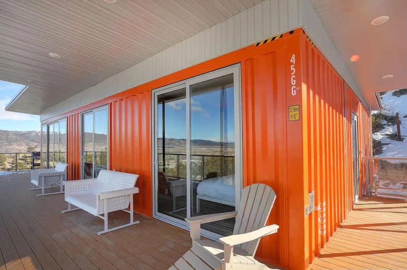 Nestled in the foothills of the Sangre de Cristo Mountains, this orange shipping container rental home is a cool getaway near Salida, Colorado