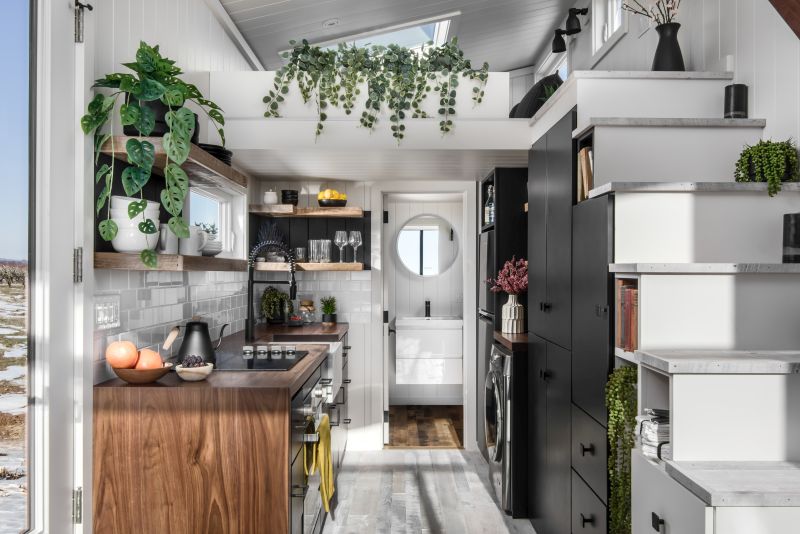 This Custom Tiny House Features a Floor-To-Ceiling Glass Wall