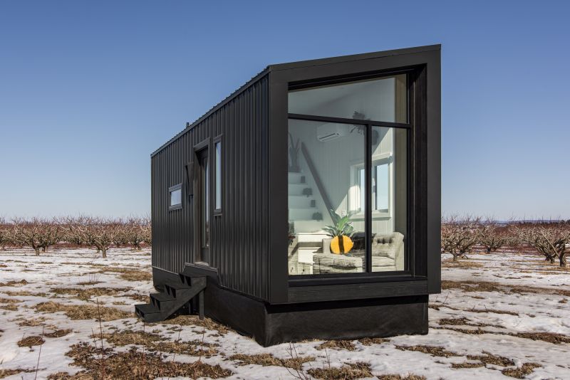 This Custom Tiny House Features a Floor-To-Ceiling Glass Wall