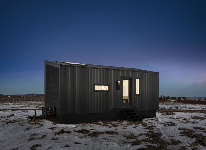 This Custom Tiny House Features a Floor-To-Ceiling Glass Wall