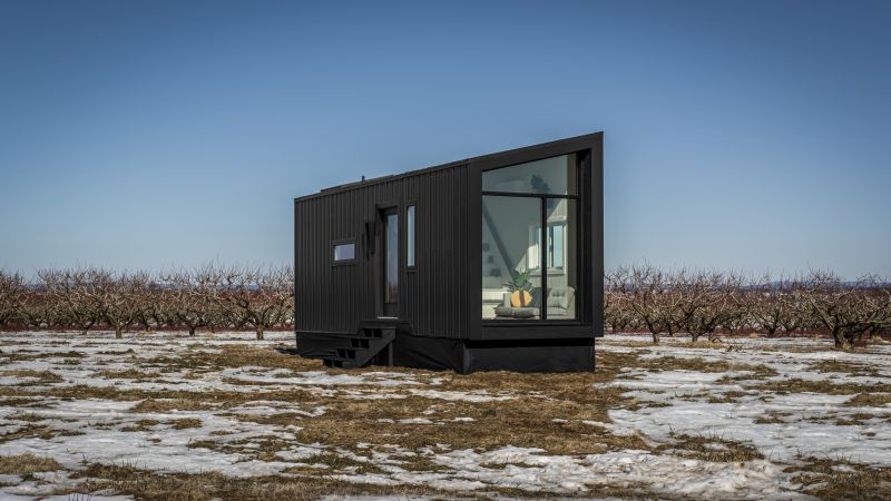 This Custom Tiny House Features a Floor-To-Ceiling Glass Wall