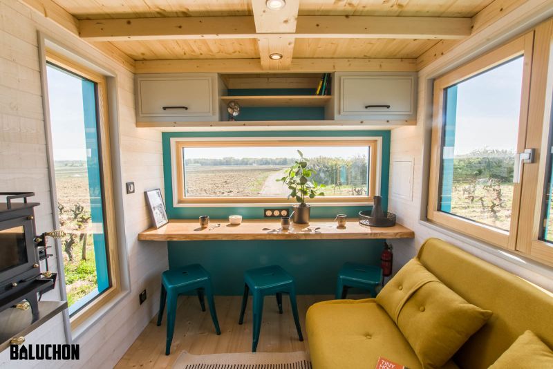 This Tiny House Features Netted Floor to Connect Loft Bedrooms