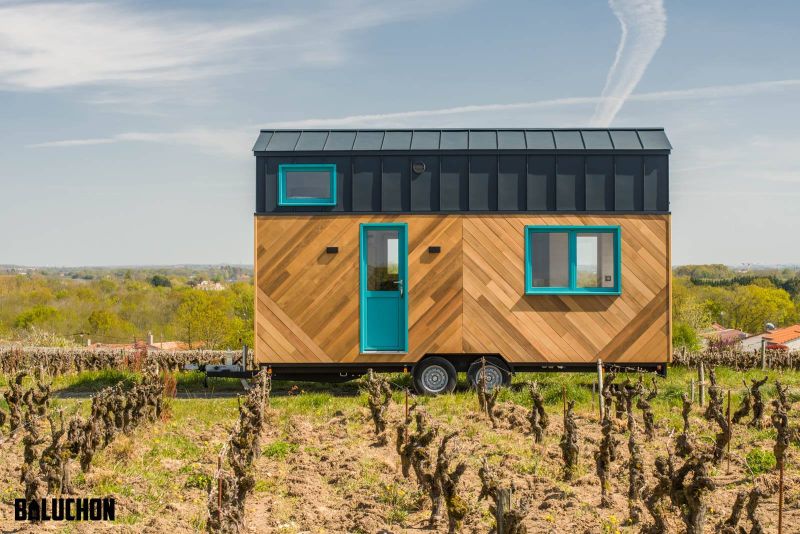 This Tiny House Features Netted Floor to Connect Loft Bedrooms